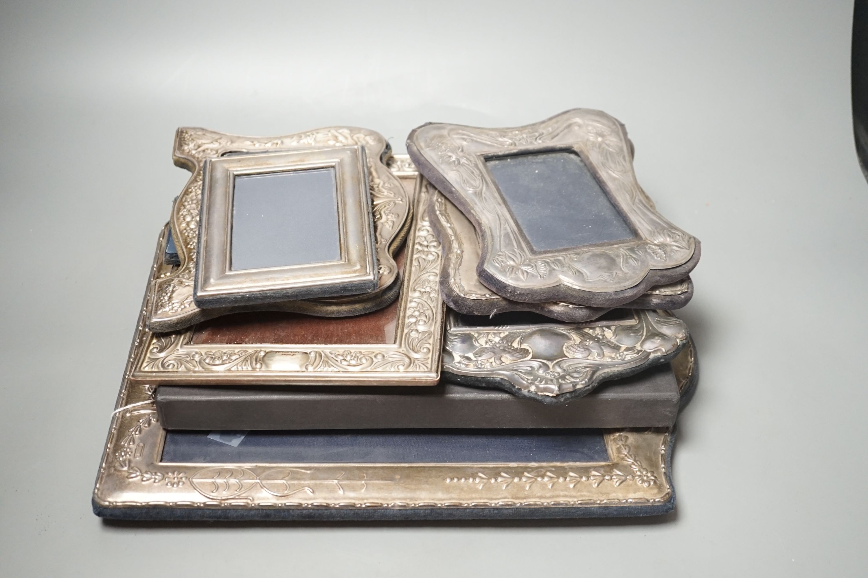 Eight assorted modern silver mounted photograph frames, various date and makers, largest 36.1cm.